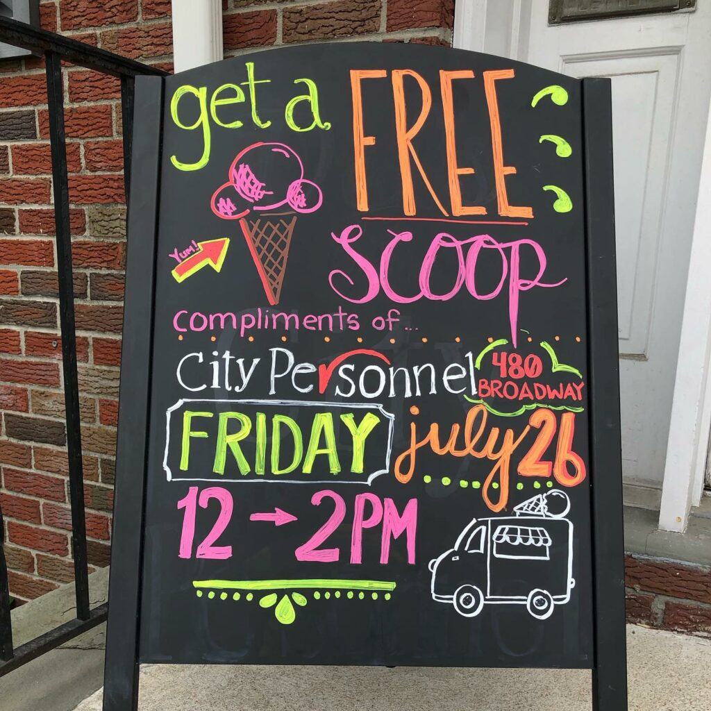 free scoop of ice cream city personnel sign