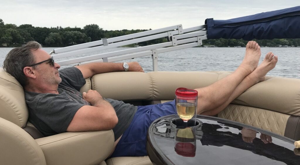 Baby Boomer on a Boat relaxing after retiring