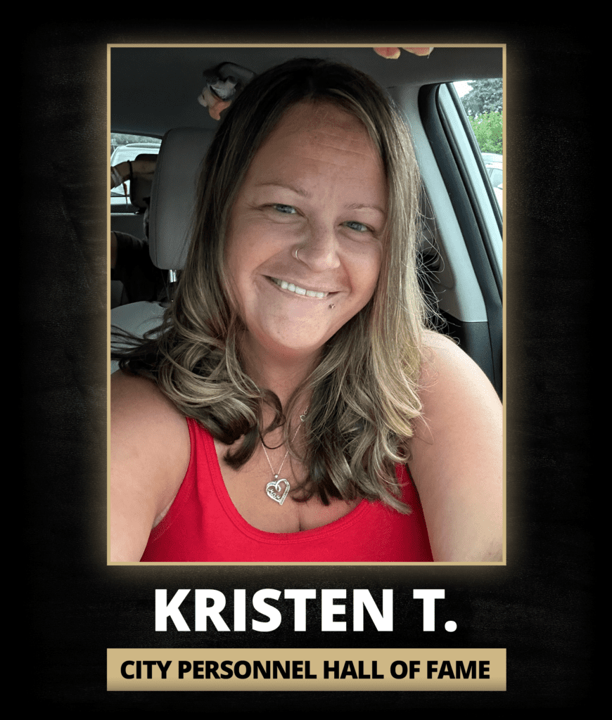 Candidate Newsletter April 2025 9 Kristen T. smiling inside a car, featured as a City Personnel Hall of Fame honoree for outstanding performance and dedication